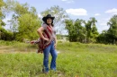 Rena Schroeder poses for a portrait on her ranch where she runs an equine learning nonprofit and cares for rescue livestock in Lott on May 4, 2026.