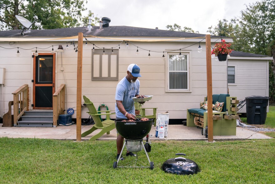 Tramelle Neldare has a deep attachment to the family home he shares with his wife, Tracey. Although they know it could flood again, they say they would never consider moving.