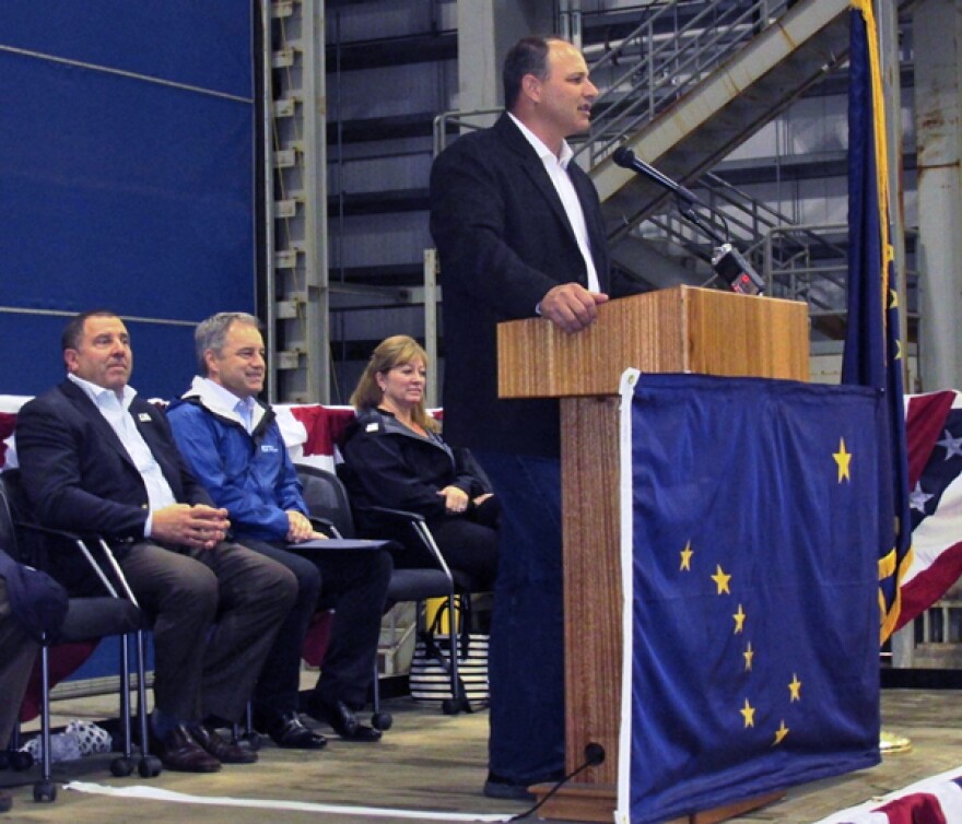 Vigor Alaska President Adam Beck speaks while Vigor CEO Frank Foti and Gov. Sean Parnell listen, seated.