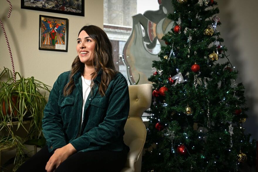 Esmeralda Sandoval stands in the Spokane office of Nuestras Raices on Thursday. Sandoval works out of the group’s Othello office.