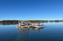 Aidan and Kit Gallagher check equipment at Little Bay Beauties oyster farm, owned by Kit Gallagher, on Monday, Oct. 19, 2026.