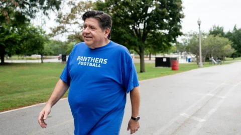 Gov. J.B. Pritzker walks along 31st Street Beach on the South Side Sept. 16.