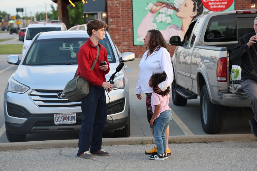 Luke Geier interviewing an attendee at the Route 66 100th anniversary celebration in Baxter Springs, Kansas, on April 30, 2026.