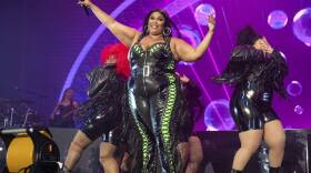 Lizzo performs at the BottleRock Napa Valley Music Festival on May 27, 2023, in Napa, Calif. Lizzo has been sued by three former dancers who accuse the Grammy winner of sexual harassment and allege the singer and her production company created a hostile work environment. (Amy Harris/Invision/AP)