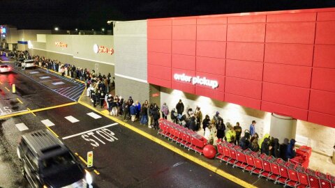 Hundreds line up for the 6 a.m. opening of the Target Store at Northpointe Plaza in north Spokane Friday, Nov. 28, 2025. The first 100 in line received a gift bag with small gift items like candy or lip gloss with the chance of receiving one of the 10 $100 gift certificates. Hundreds more stood in line to take advantage of early specials on Black Friday.