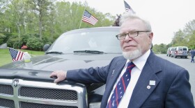 Paul Monti next to the truck of his son, Jared Monti. Jared Monti died while serving in Afghanistan in 2006. (Anna Miller/Here & Now)