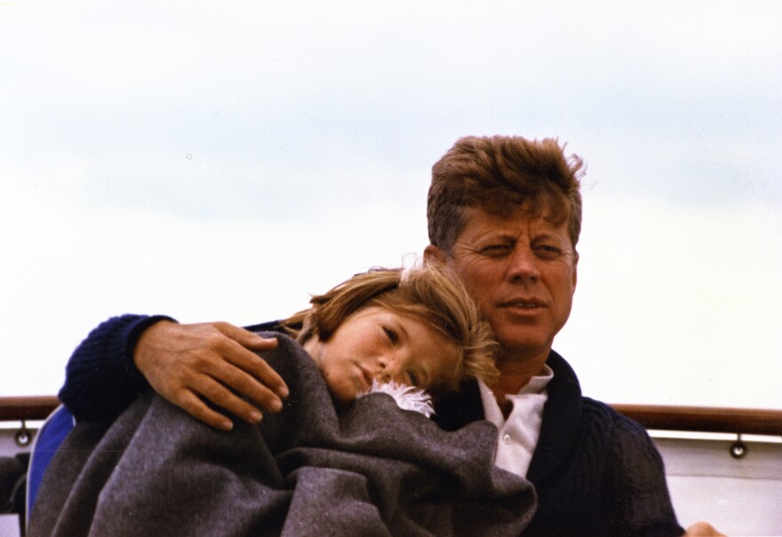 President Kennedy and his daughter Caroline on a yacht during a weekend in Hyannis Port.