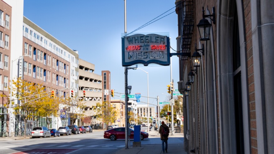 Wheeler Mission offers emergency shelter. Services include meals, clothing, showers, and case management with social service referrals.