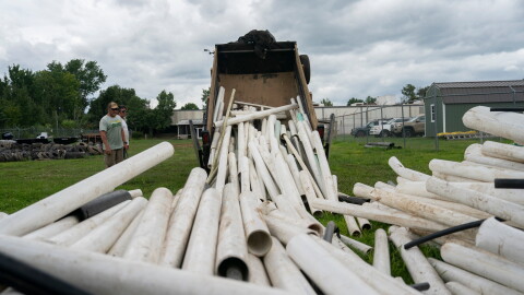 IPEX PVC pipe cleared from the riverbank is dumped at MountainTrue headquarters Wednesday, July 22, 2026, in Alexander, N.C.