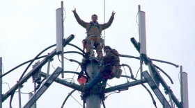 Jay Guilford, top, fell to his death in 2008 while installing cell phone antennas on a tower in Indiana.