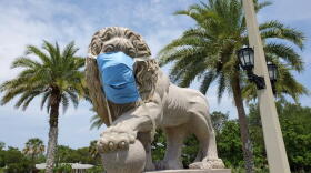 The statues on the eastern side of the Bridge of Lions in St. Augustine were adorned with facemasks in April.