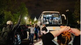  Two buses transporting migrants from Texas arrive at Union Station on April 21. Gov. Greg Abbott’s recent plan to bus migrants to the nation's capital is in response to the end of Title 42, a pandemic-era emergency health order allowing immigration authorities at the border to expel asylum-seeking migrants as a way to contain the coronavirus. 