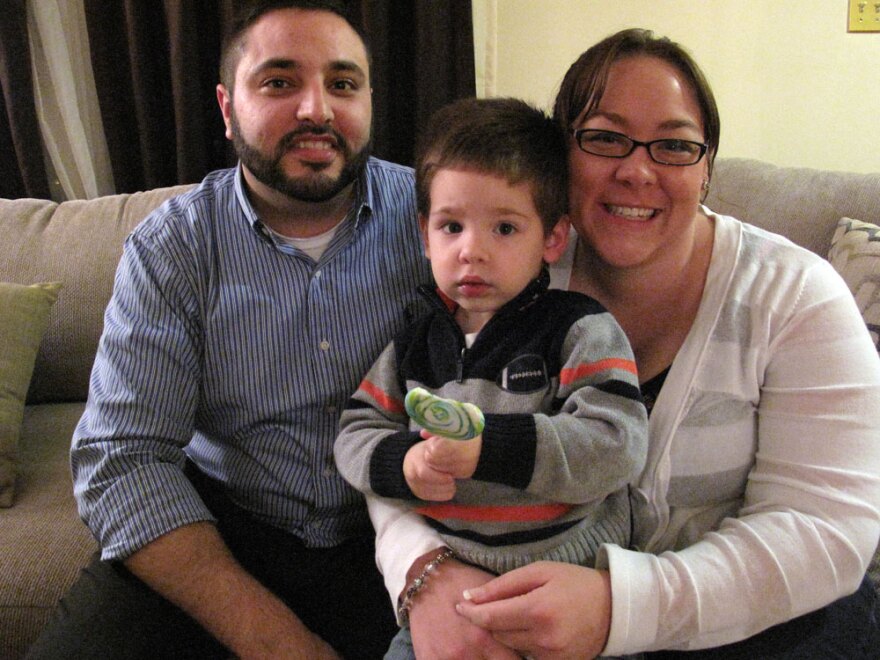 Andrew Felices and Mellissa Giles of Frederick, Md., shown here with their toddler son, A.J., say they are not in any rush to tie the knot.