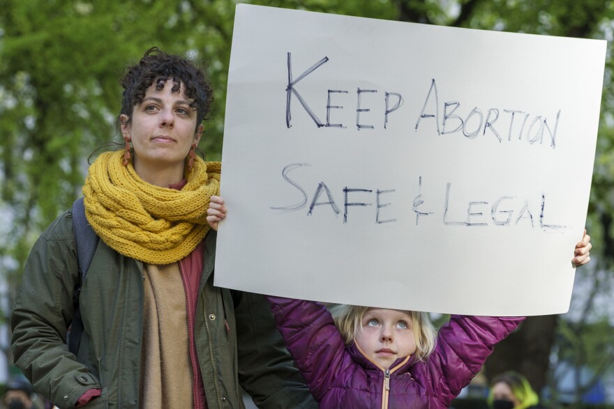 PORTLAND, Ore.: Danielle LaSusa (left) and her daughter Kaia, 6, at a rally in support of abortion rights. "I want her to live in a world where she can have safe access to health care," says LaSusa.