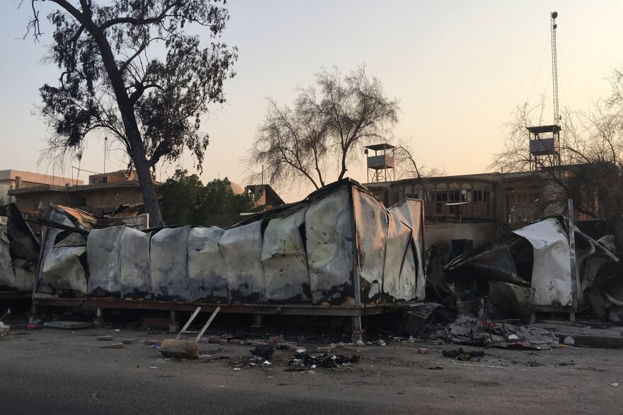 Remains of the provincial governor's guest house near Basra's corniche after being burned by anti-government protesters.