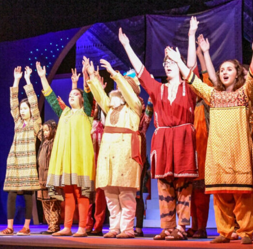 Students in ArtsBuild’s Imagine! Program on stage.