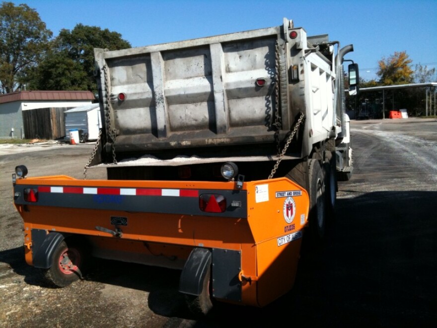 A dump truck outfitted with a sanding device in 2009. The city has 15 trucks ready to clear the city if it snows tonight.