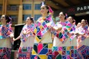 A photo of dancers from Ballet Folklorico Quetzalcoatl performing a Mexican number.