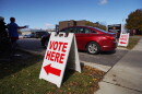 A driver pulls into the Summit County Board of Elections Early Vote Center in Downtown Akron on Wednesday, Nov. 1, 2023.