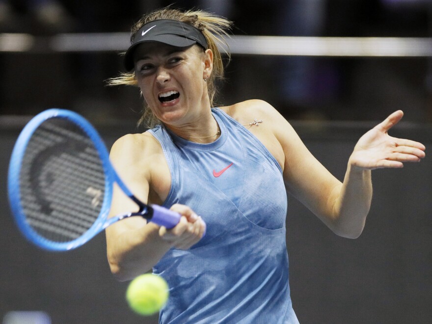 Maria Sharapova, of Russia, returns the ball to Daria Gavrilova, of Australia, during the 2019 St. Petersburg Ladies Trophy tennis tournament match in St. Petersburg, Russia.