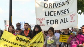 embers of Movimiento Cosecha Indiana march along the White River in Indianapolis, demanding driver's licenses for undocumented Hoosiers.