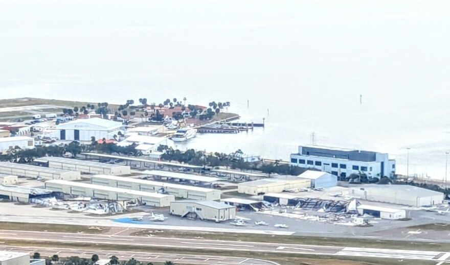 Aerial view of an airport with hurricane damage