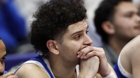 Kentucky guard Koby Brea sits on the bench during the second half of an NCAA college basketball game against Kentucky in the quarterfinal round of the Southeastern Conference tournament, Friday, March 14, 2025, in Nashville, Tenn. (AP Photo/Wade Payne)