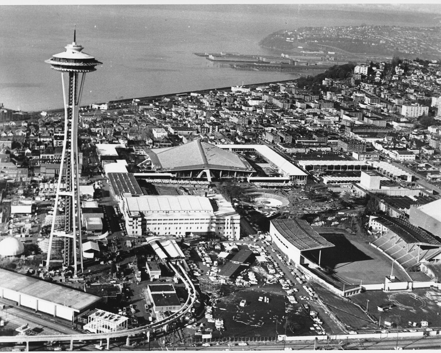 This is a photo of Seattle during the World's Fair on Feb. 12, 1962.  Beyond is a view of Puget Sound and the 600 foot Space Needle to the left.