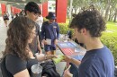 College students pass out Plan B to educate young voters at Florida Atlantic University on Thursday, April 11, 2024, in Boca Raton, Fla. Abortion and marijuana will be on Florida's November ballot, and these issues are critical issues for young voters.