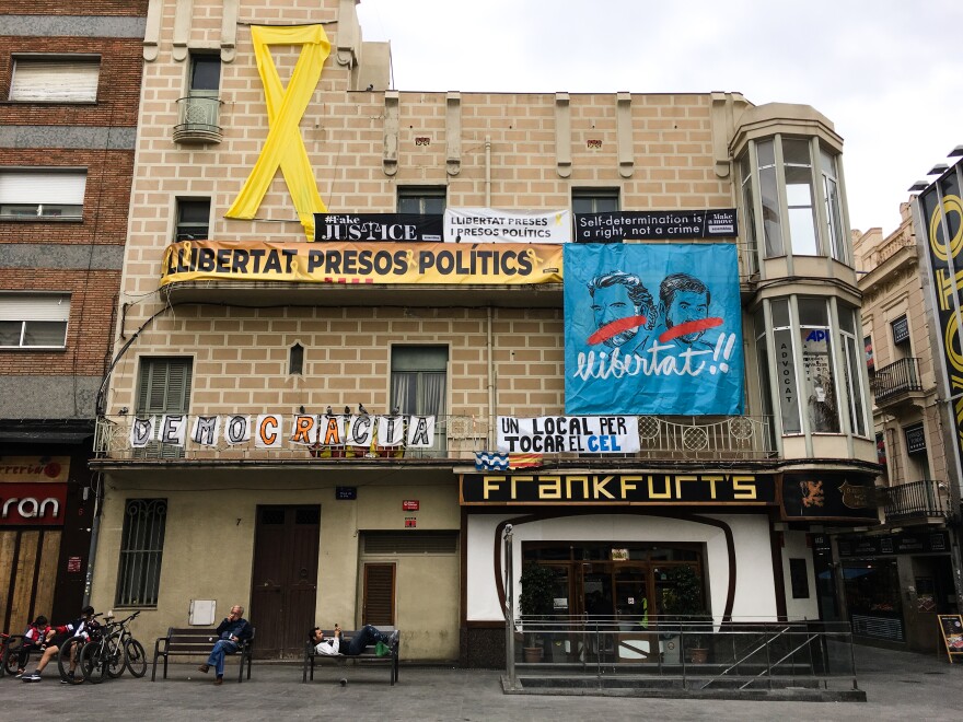 Pro-Catalan independence signs in Badalona, a town on the outskirts of Barcelona, demand the release Catalan nationalists held prisoner. In October 2017, nine separatist leaders were arrested after Catalonia staged an independence vote deemed illegal by Spain.