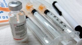 Several syringes on a table