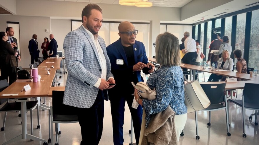 D. Rashaan Gilmore (center), president and CEO of BlaqOut, spoke with Stacy Mayer, CEO of Seton Center, and Ryan Hudnall, executive director of Della Lamb, after a March 20 roundtable discussion organized by Kansas City Mayor Quinton Lucas.