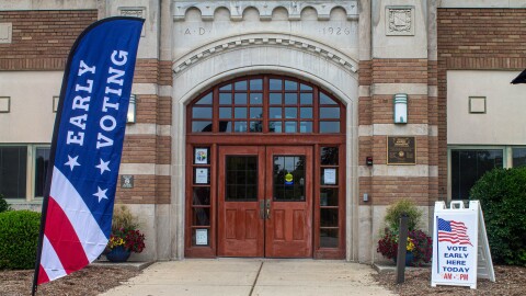 Hannah Community Center with an early voting flag and sign.