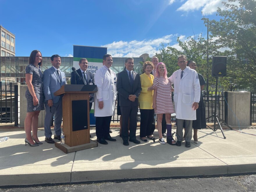 Officials gather outside of Henry Ford Hospital