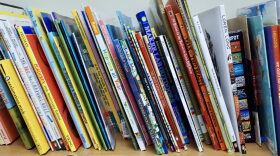 Books line a shelf in a kindergarten classroom at Mayo Demonstration School in Tulsa on April 8. Oklahoma will receive $11.2 million this year from a federal grant for child literacy initiatives.