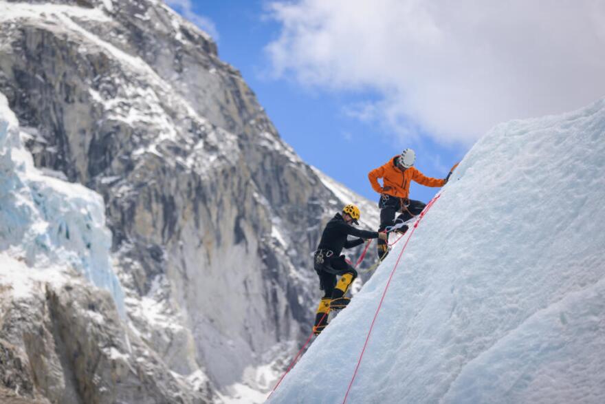 Climbers from the Mounain Professionals team staying fit and practicing skills at basecamp during the wait for the route to open. (Courtesy of Ryan Waters/Mountain Professionals)