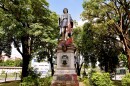 FILE - A vandalized statue of Christopher Columbus towers over Columbus Square in Port of Spain, Trinidad and Tobago, on Aug. 28, 2024.