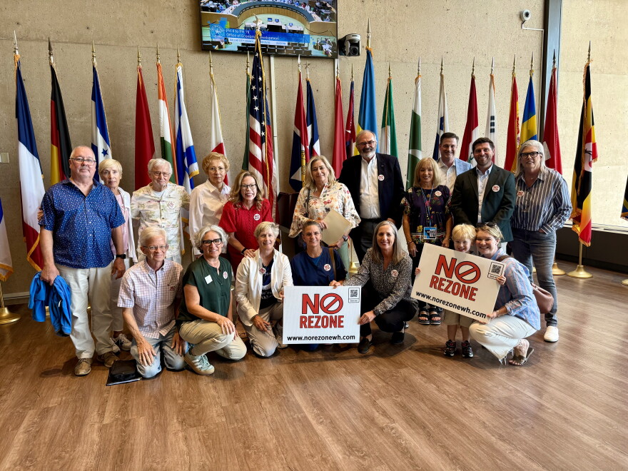 District 13 residents waited five hours to speak on the Walnut Hill zoning case on August 25 but the item was deferred until September.