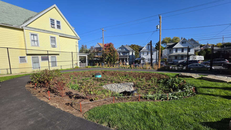 A stormwater management feature at the new schoolyard will provide lessons on watersheds.