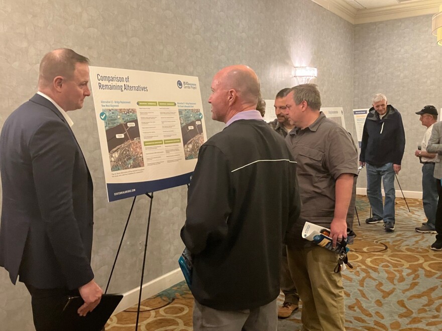 Many members of the public reviewed alternatives to replace the Centennial Bridge Wednesday afternoon, May 20, at the Rock Island Holiday Inn, and spoke with representatives of the Illinois and Iowa Departments of Transportation.