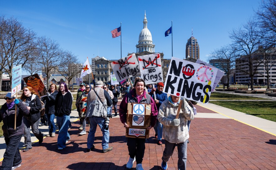 Thousands gathered at the Michigan Capitol in Lansing, Mich., on March 28, 2026, for a No Kings rally.