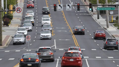 Traffic is seen at an intersection on York Road, Tuesday, May 12, 2020, in Lutherville-Timonium, Md. Tuesday, May 12, 2020. Americans are slowly getting back on the road after hunkering down amid the coronavirus pandemic, though driving still is well below what it was before many states issued stay-at-home orders. (AP Photo/Julio Cortez)