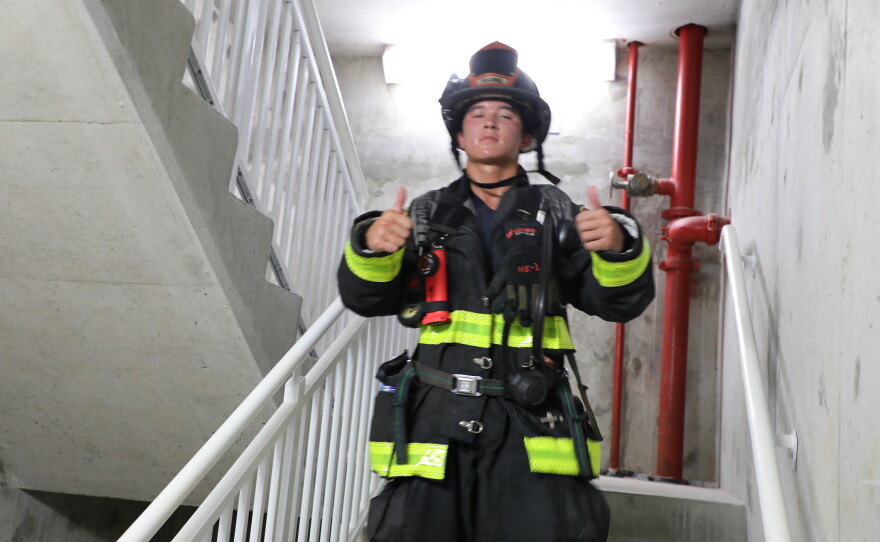 Firefighters participate in the 9-11 stair climb on Navarre Beach.