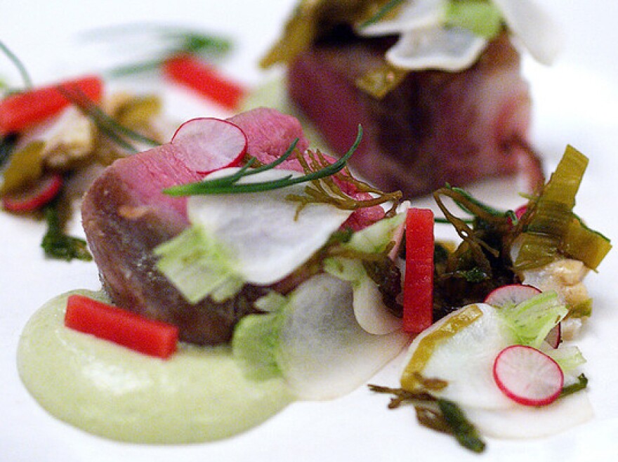 Slow-cooked pork with geoduck clam and fresh seaweeds.