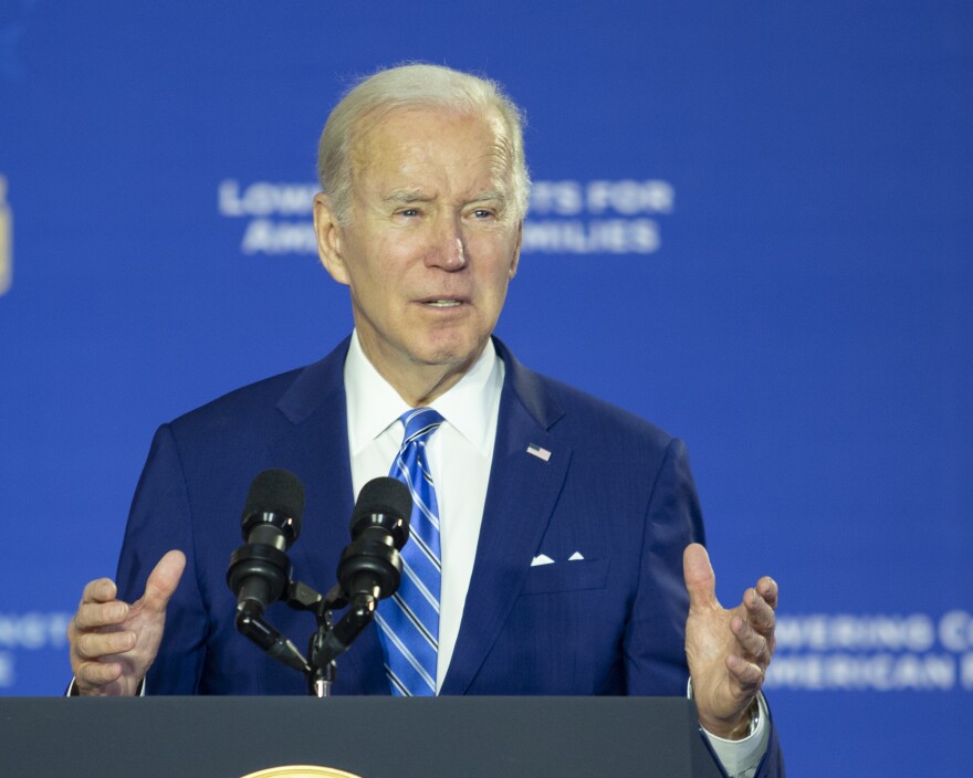 Joe Biden speaking at the podium