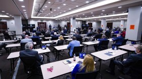 Members of the Indiana House convene in the House chamber in the Indiana Government Center in Indianapolis, Monday, Jan. 4, 2021. The House is meeting in a conference room in the state office building to increase social distancing due to COVID-19.