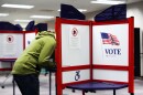 FILE - A person votes early in the Virginia redistricting referendum at the Fairfax County Government Center, April 3, 2026, in Fairfax, Va.