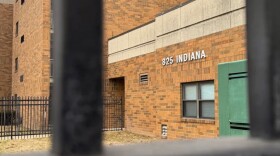 Indiana Avenue Apartments seen through a fence on Feb. 12, 2025, in Indianapolis.