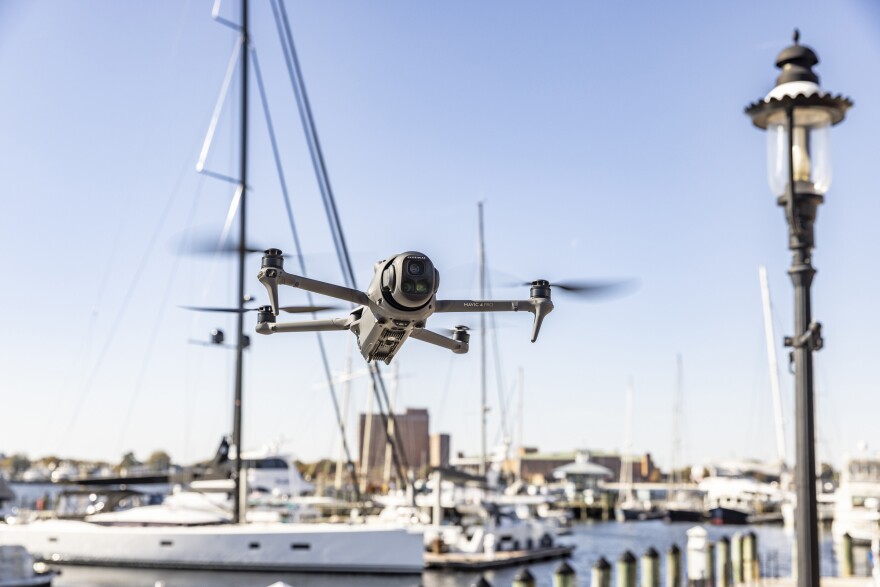 An aerial drone hovers above the Elizabeth River waterfront in Downtown Norfolk.