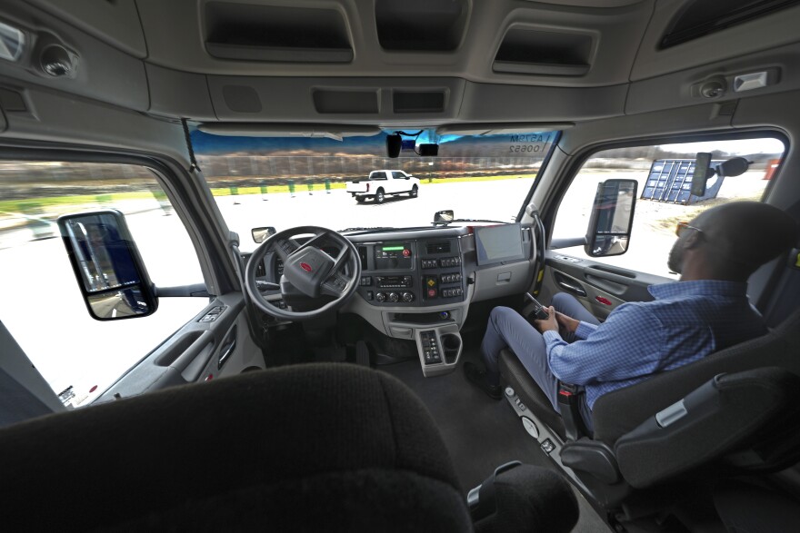 The interior of the cab of a self driving truck is shown as the truck maneuvers around a test track in Pittsburgh, Thursday, March 14, 2024. The truck is owned by Pittsburgh-based Aurora Innovation Inc.